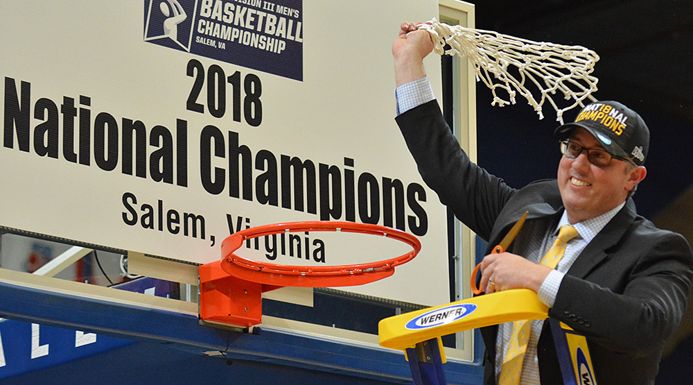 Dale Wellman cutting the net down