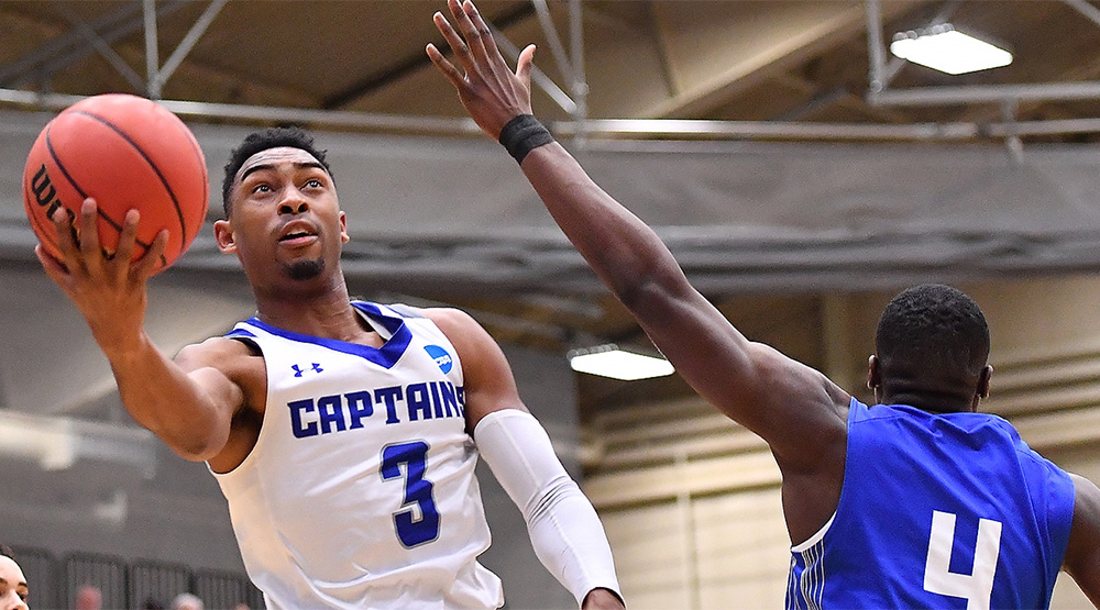 Marcus Carter takes the ball to the basket against Hamilton. (CNU athletics photo by Joshua D. McKee)